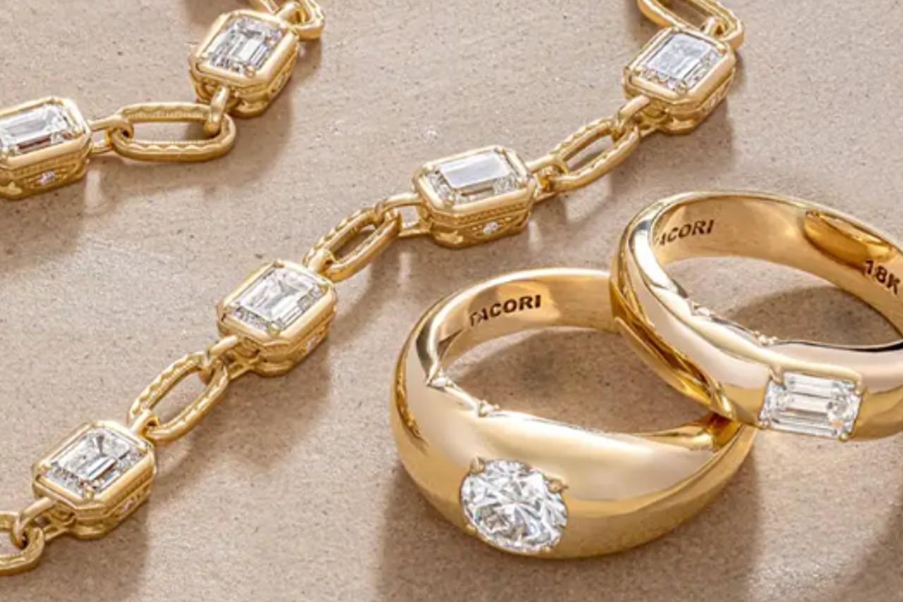 A gold and diamond necklace and two gold and diamond fashion rings by TACORI