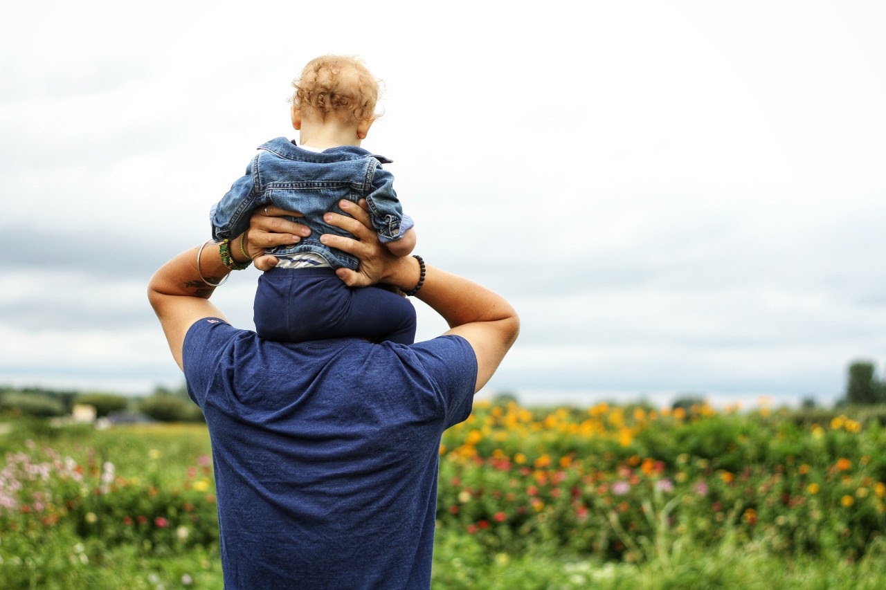 father and son in field