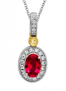 A ruby pendant with diamonds around the oval red stone