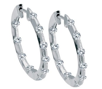 Brevani features these notable white gold hoops with glittering diamond accents