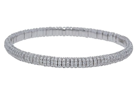 This diamond-encrusted bracelet from Roberto Demeglio is forged in ceramics and coated in white gold