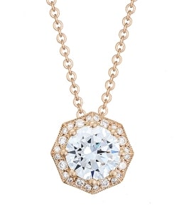 A yellow gold solitaire diamond necklace from TACORI