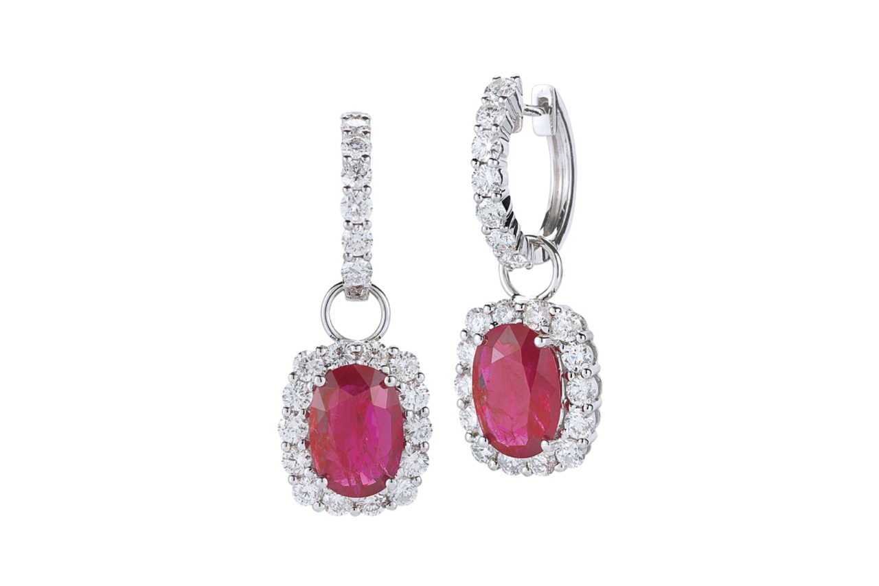 A pair of ruby and diamond drop earrings.