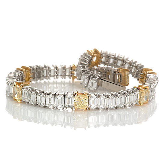 Emerald cut Diamonds and Yellow Diamond Bracelet in Platinum